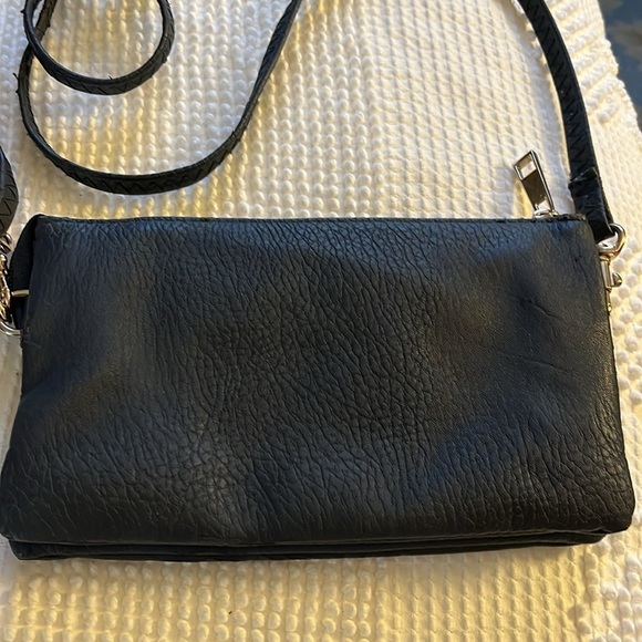 No brand navy blue leather small handbag. Gold metal design on the front. - Picture 6 of 10